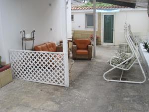 Patio nebo venkovní prostory v ubytování Santos B&B