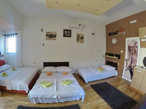 a hotel room with two beds at Studio Jegdic in Trebinje