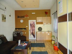 a living room with a couch and a table at Studio Jegdic in Trebinje