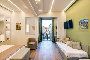 A bed or beds in a room at Cuore di Sorrento Suites