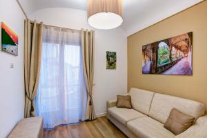 A seating area at Cuore di Sorrento Suites