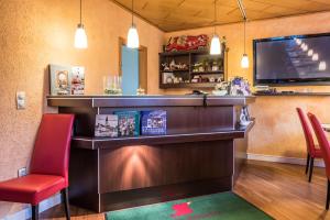 TV o dispositivi per l'intrattenimento presso Hotel Sperling mit E-Ladestation