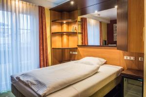 Letto o letti in una camera di Hotel Sperling mit E-Ladestation