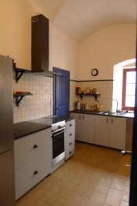 Kuchyň nebo kuchyňský kout v ubytování Apartment Provaznicka