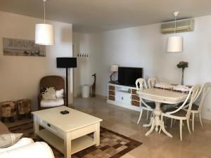 A seating area at Casa Holandaluzas Marbella near Beach, with salt water Pool and private parking