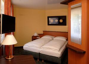 Letto o letti in una camera di Hotel Sperling mit E-Ladestation