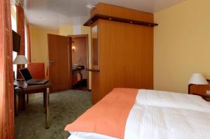 Letto o letti in una camera di Hotel Sperling mit E-Ladestation