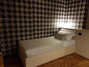 Letto o letti in una camera di Park Hotel Meublé
