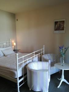 Un pat sau paturi într-o cameră la Cascina nel Bosco
