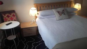 Voodi või voodid majutusasutuse St. Aiden's Guesthouse toas