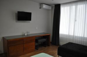 TV a/nebo společenská místnost v ubytování AMD Hotel + 37 fotografií