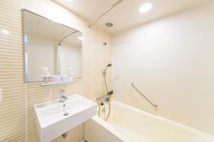Koupelna v ubytování Nishitetsu Resort Inn Naha