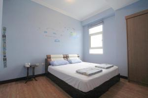 Postel nebo postele na pokoji v ubytování 驫風民宿 Equuleus Homestay + 22 fotografií