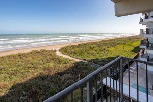 a view of the beach from the balcony of a condo at Florence in South Padre Island