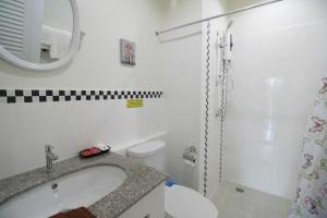 Ванна кімната в Sirimunta Hotel Chiang Rai Suite & Residence