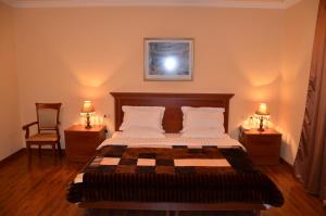 Posteľ alebo postele v izbe v ubytovaní Dian Hotel