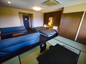 Posezení v ubytování Route Inn Grantia Hidatakayama Wakura no yado