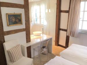 Postel nebo postele na pokoji v ubytování Boutique Hotel am Rathaus - Reblaus
