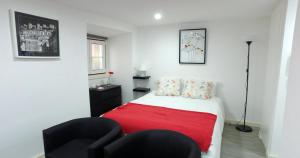 Postel nebo postele na pokoji v ubytování Alfama 44