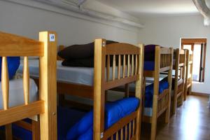 Posteľ alebo postele v izbe v ubytovaní Albergue Vive tu Camino