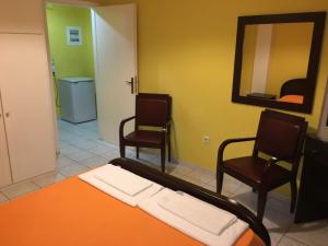 Postel nebo postele na pokoji v ubytování Argo Apartments