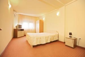 Postel nebo postele na pokoji v ubytování Hotel Class