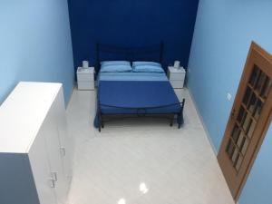 Posteľ alebo postele v izbe v ubytovaní La Casa di Simone
