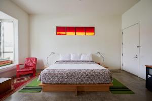 Postel nebo postele na pokoji v ubytování Hotel San Jose