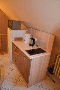 A kitchen or kitchenette at Németh Vendégház