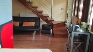 A seating area at Apartamentos Santana