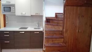 A kitchen or kitchenette at Apartamentos Santana