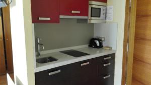 A kitchen or kitchenette at Apartamentos Santana