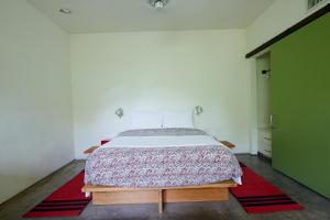 Postel nebo postele na pokoji v ubytování Hotel San Jose