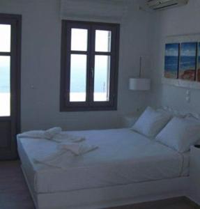 Cama ou camas em um quarto em Mar Inn Hotel