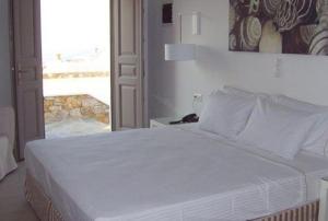 Cama ou camas em um quarto em Mar Inn Hotel
