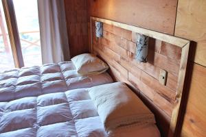 Voodi või voodid majutusasutuse Hostal Boutique Los Arrayanes toas