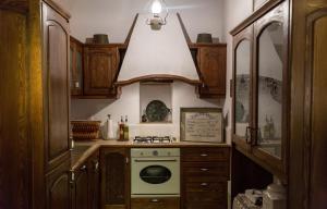 Η κουζίνα ή μικρή κουζίνα στο Villa Amanti  +28 φωτογραφίες