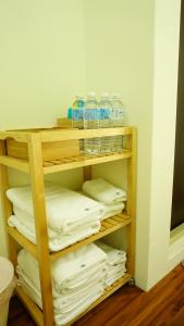 A bed or beds in a room at Warm Home