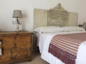 Voodi või voodid majutusasutuse Masseria Spartivento toas