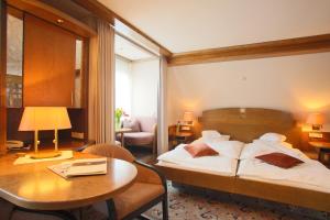 Postel nebo postele na pokoji v ubytování Hotel Brielhof