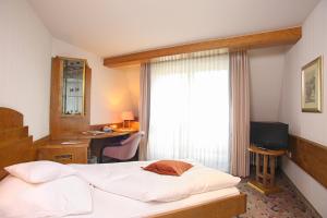 Postel nebo postele na pokoji v ubytování Hotel Brielhof