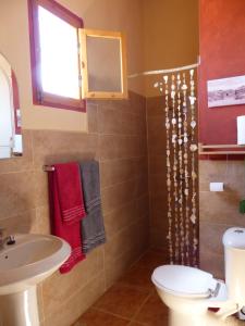 a bathroom with a toilet and a sink at Think Love on Red Sea in Nuweiba