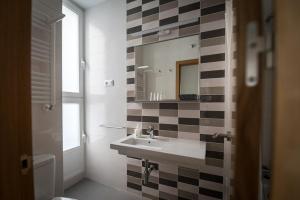 Ett badrum på Hostal Carracedo