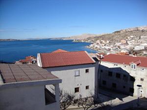 a view of a city and a body of water at LARA & VITO in Metajna