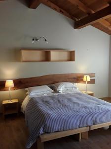 Postel nebo postele na pokoji v ubytování Sostio a Levante