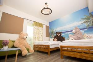 Postel nebo postele na pokoji v ubytování Hai Yang Homestay