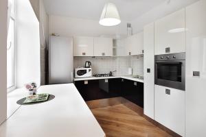 Art Deco Apartment on Kyrova 5 tesisinde mutfak veya mini mutfak