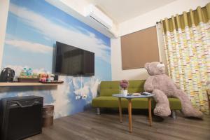 TV a/nebo společenská místnost v ubytování Hai Yang Homestay