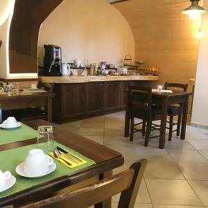 Ресторант или друго място за хранене в Giardino alla Torre Bed&Breakfast