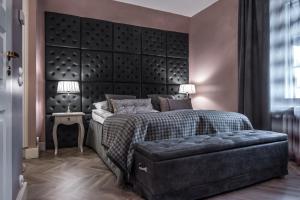 Postel nebo postele na pokoji v ubytování Boutique Hotel Yöpuu